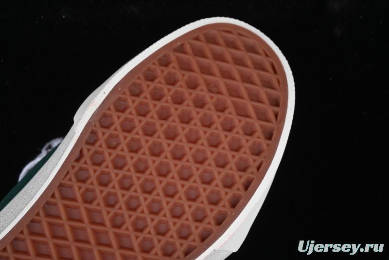 Classic Green Suede Skate Shoes with Signature Wave Design
