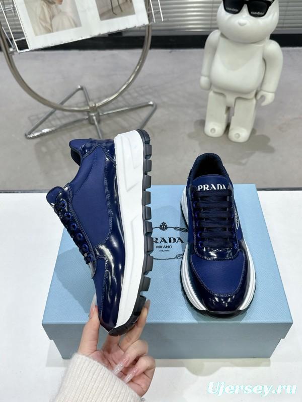 2025 Women Prada Blue Leather Sneakers KFY00310