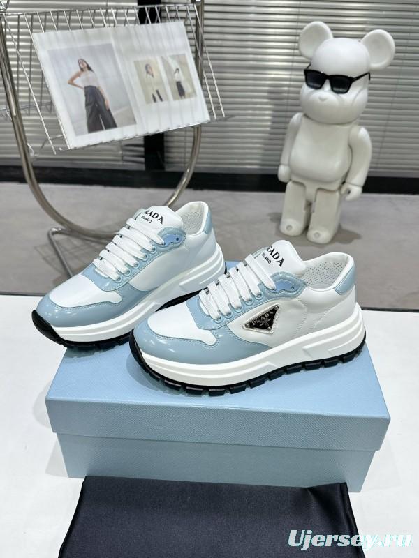 2025 Women Prada Light Blue White Leather Sneakers KFY00310