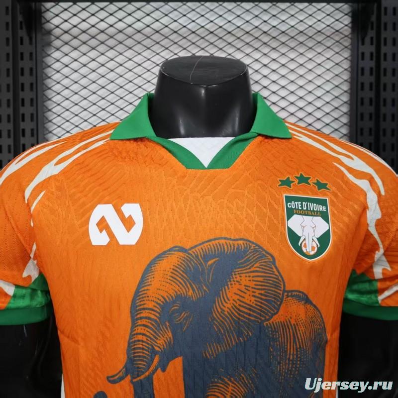 Player Version 2025 Ivory Coast Orange with Elephant Graphic and Green Accents Jersey